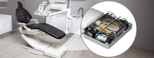 A-dec dental chair with zoomed-in focus on automatic dental unit waterline box